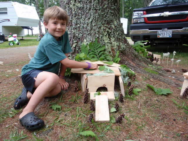 Meet Graham, Saylor's brother.  His Lizard Jasmine shares this house with the fairies and Graham says it's special because it has great leaves and seashells.