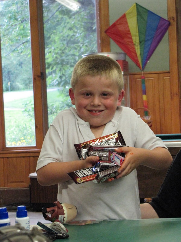 Josh won an armload of candy bars!